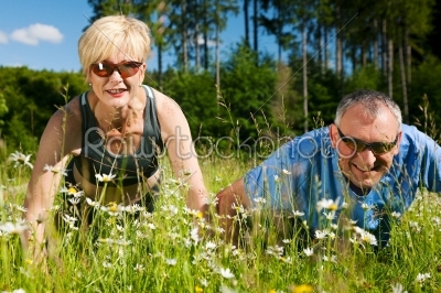 Mature couple doing sport outdoors
