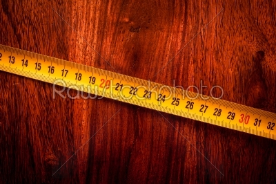 Measure tape on wood