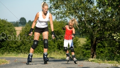 Mother and daughter skating