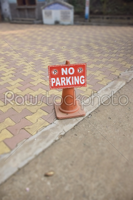 No Parking sign in front of some unknown place..