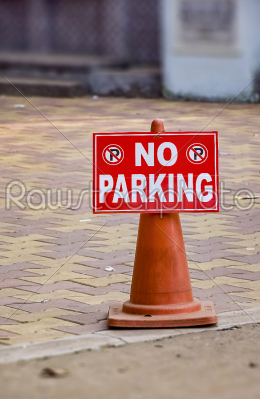 No Parking sign in front of some unknown place..