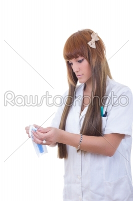 nurse opens the syringe