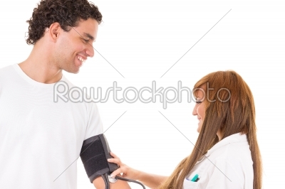 nurse or doctor measures the blood pressure of a satisfied and s
