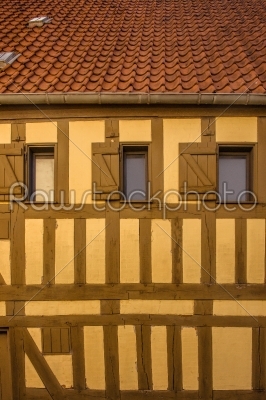 Old yellow building with windows