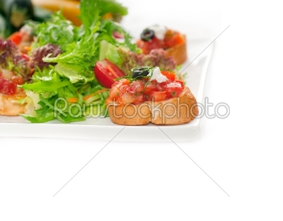 original Italian fresh bruschetta served with fresh salad and ve