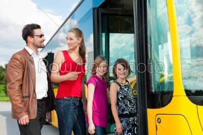 Passengers boarding a bus