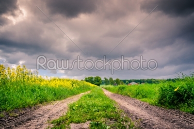 Path with dark clouds