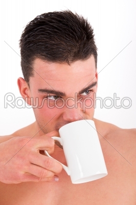 portrait of attractive man drinking tea