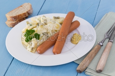 Potato salad with sausage and mustard