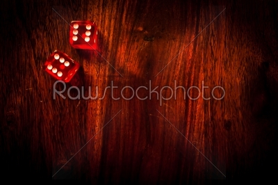 Red dice on a table