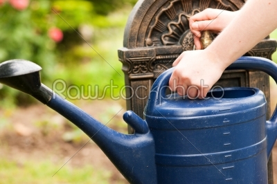 Refilling the watering pot