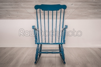 Rocking chair on wooden floor