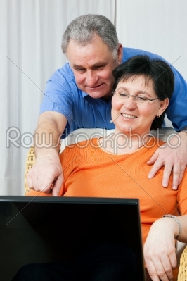 Senior couple surfing Internet