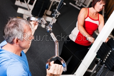 senior people exercising  in gym