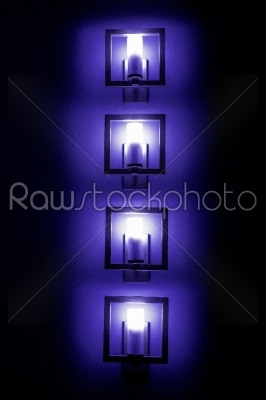 Set of bluewall lamps in the darkness