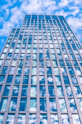 Skyscraper with sky reflection