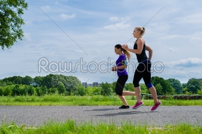 Sports outdoor - young women running in park