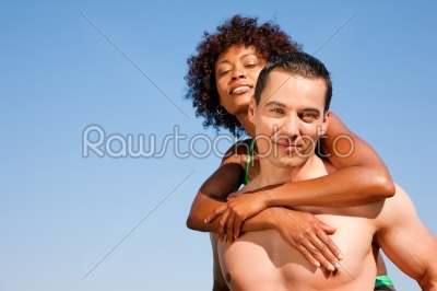 Summer bikini girl with boyfriend