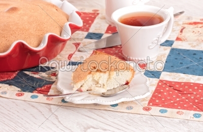 tea time with apple Pie and berry on red-blue napkin