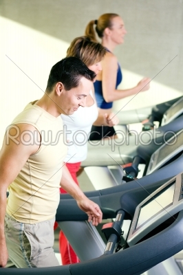 Three on the treadmill