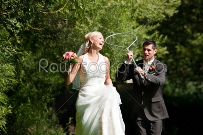 Wedding - Groom catching his bride with dip net