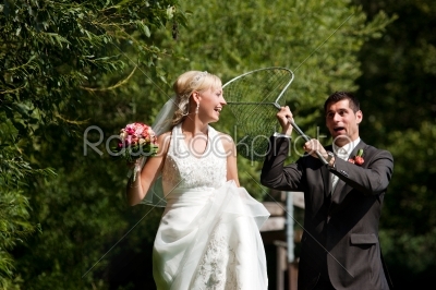 Wedding - Groom catching his bride with dip net