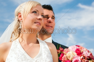 Wedding couple looking into future