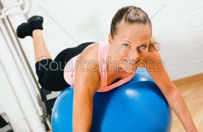 Woman and fitness ball