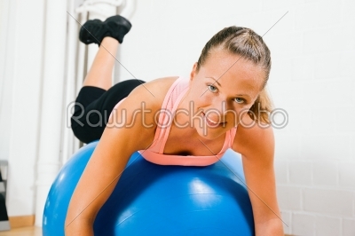 Woman and fitness ball