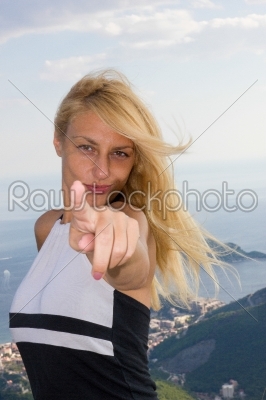 woman pointing a finger at the camera