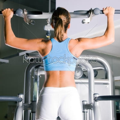 Woman working out in gym