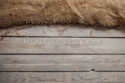 Wood background with hessian textile