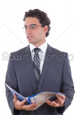 Young businessman holding an open notebook