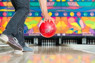 Young man bowling having fun