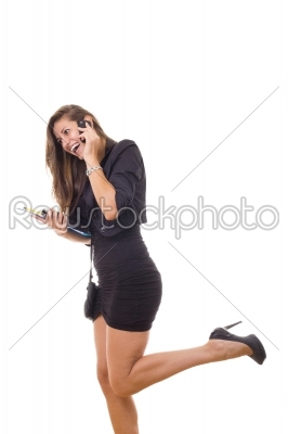young smiling business woman with a notes talking on the phone