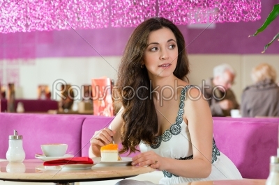 Young woman in ice cream parlor