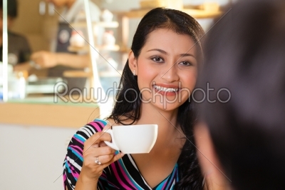Young women in an Asian coffee shop