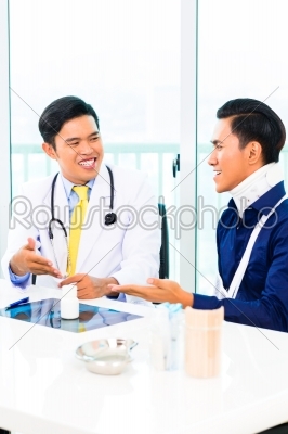 stock photo: asian doctor showing xray photography-Raw Stock Photo ID: 38605