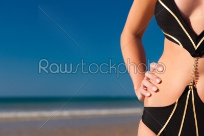 stock photo: attractive woman in monokini on beach-Raw Stock Photo ID: 40342