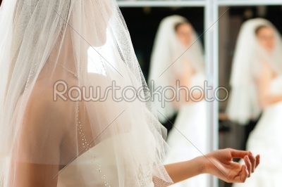 stock photo: bride at the clothes shop for wedding dresses-Raw Stock Photo ID: 41582