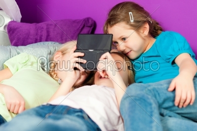stock photo: children playing video games-Raw Stock Photo ID: 41389