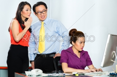 Asian colleagues mobbing or bullying employee