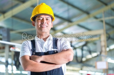 Asian Worker in a factory or industrial plant