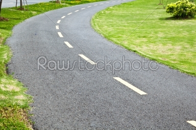 asphalt way in the park for joggler