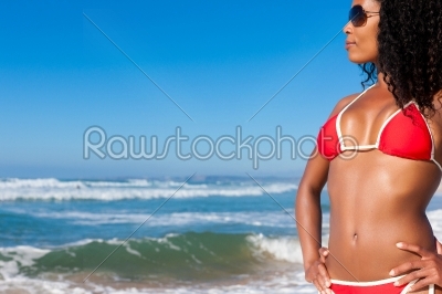 Attractive Woman in bikini on beach