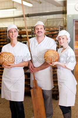 Baker with his team in bakery