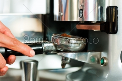 Barista prepares espresso
