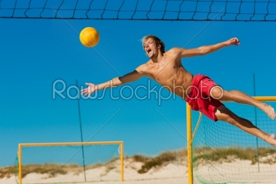 Beach volleyball - man jumping
