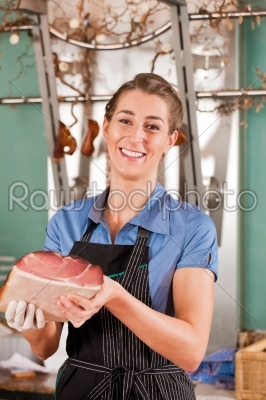 Beautiful Butcher with Raw Meat