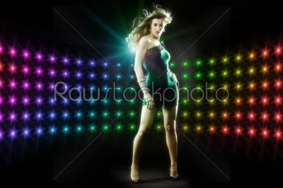 Beautiful girl dancing in club disco